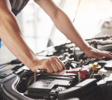 Auto mechanic working garage repair service scaled 1 360x320